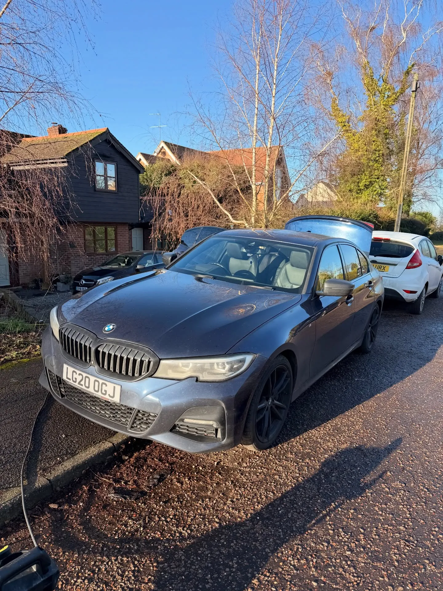 The same BMW 3 Series before the valet